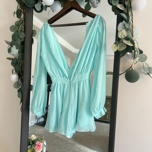 Mint green romper with open back and flowy sleeves #festivalvibes #romperlove